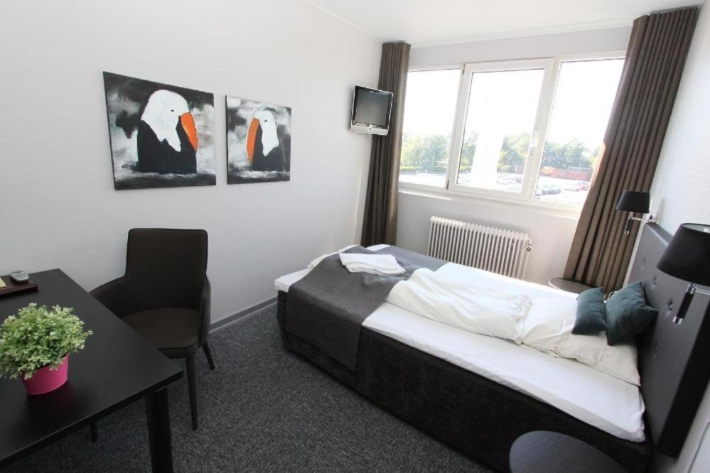 Banegaardshotellet Vojens Exteriör bild